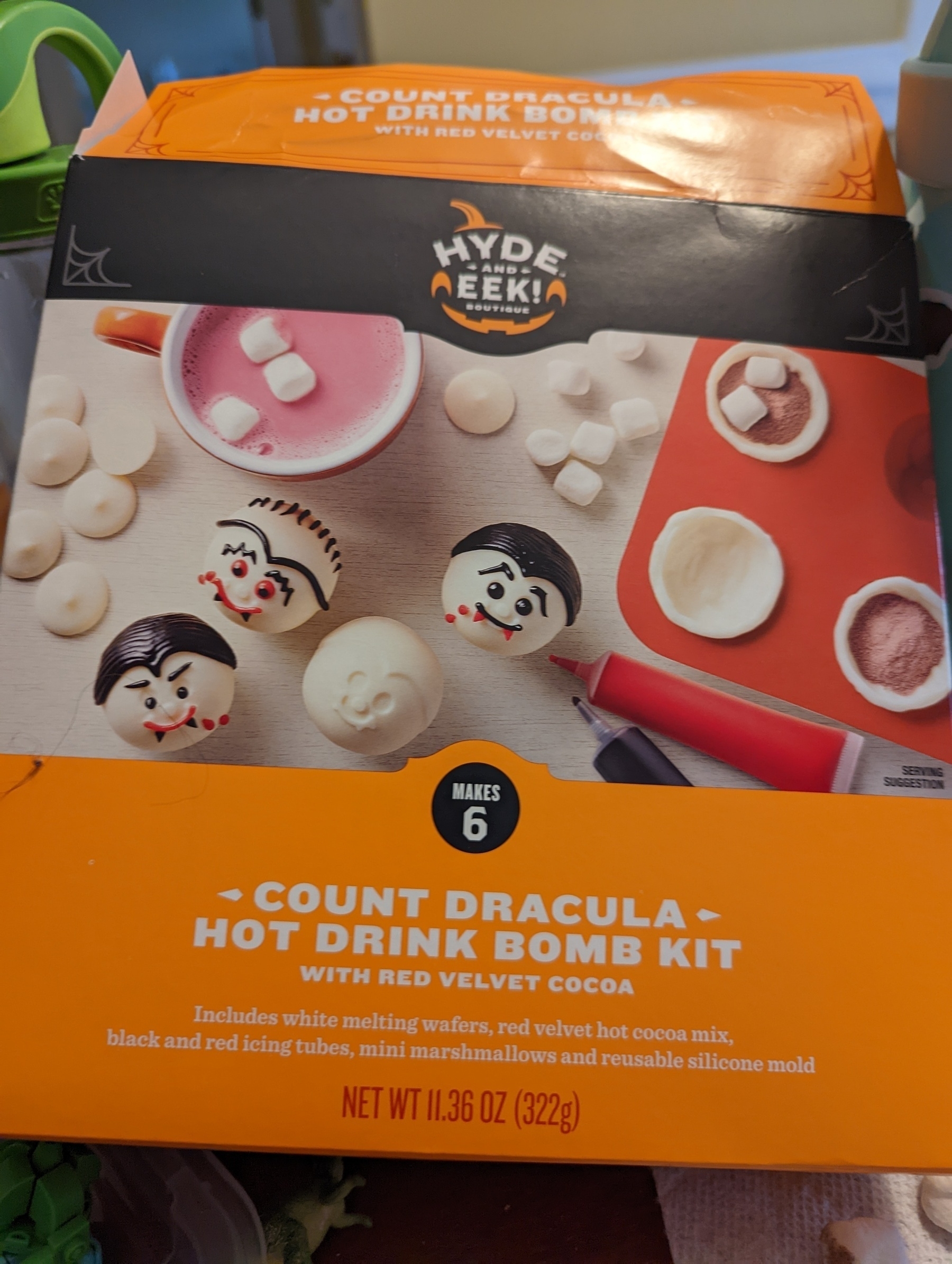 A box depicting beautifully painted hot cocoa bombs, reading "Count Dracula Hot Drink Bomb Kit"